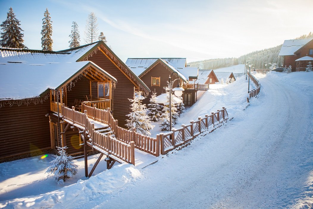 View of beautiful snowy mountains, forests, at Bukovel